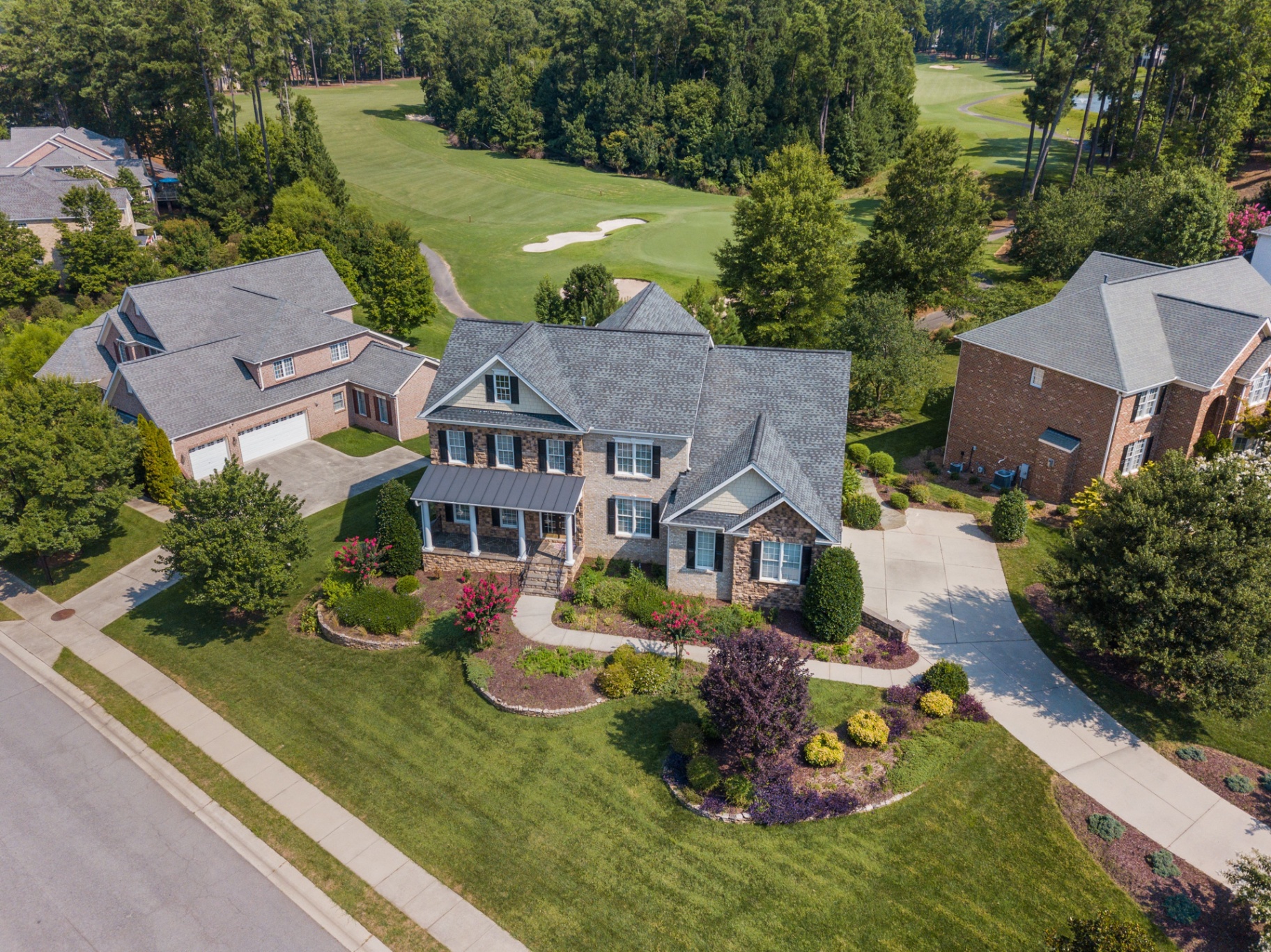 Aerial of luxury home on golf course fairway