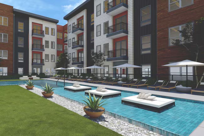 Apartment community pool area with lounge seating