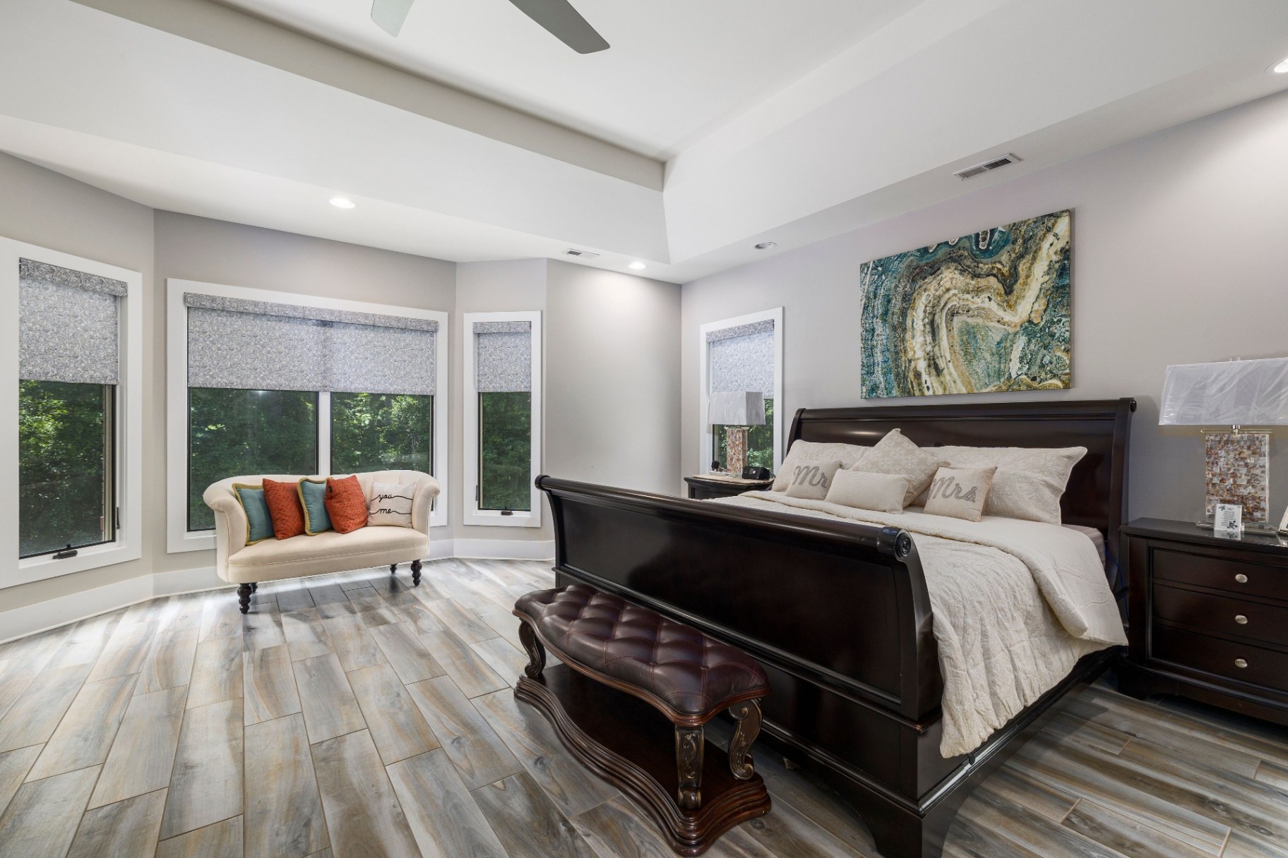 Interior 31804 — primary bedroom with sleigh bed and bay window