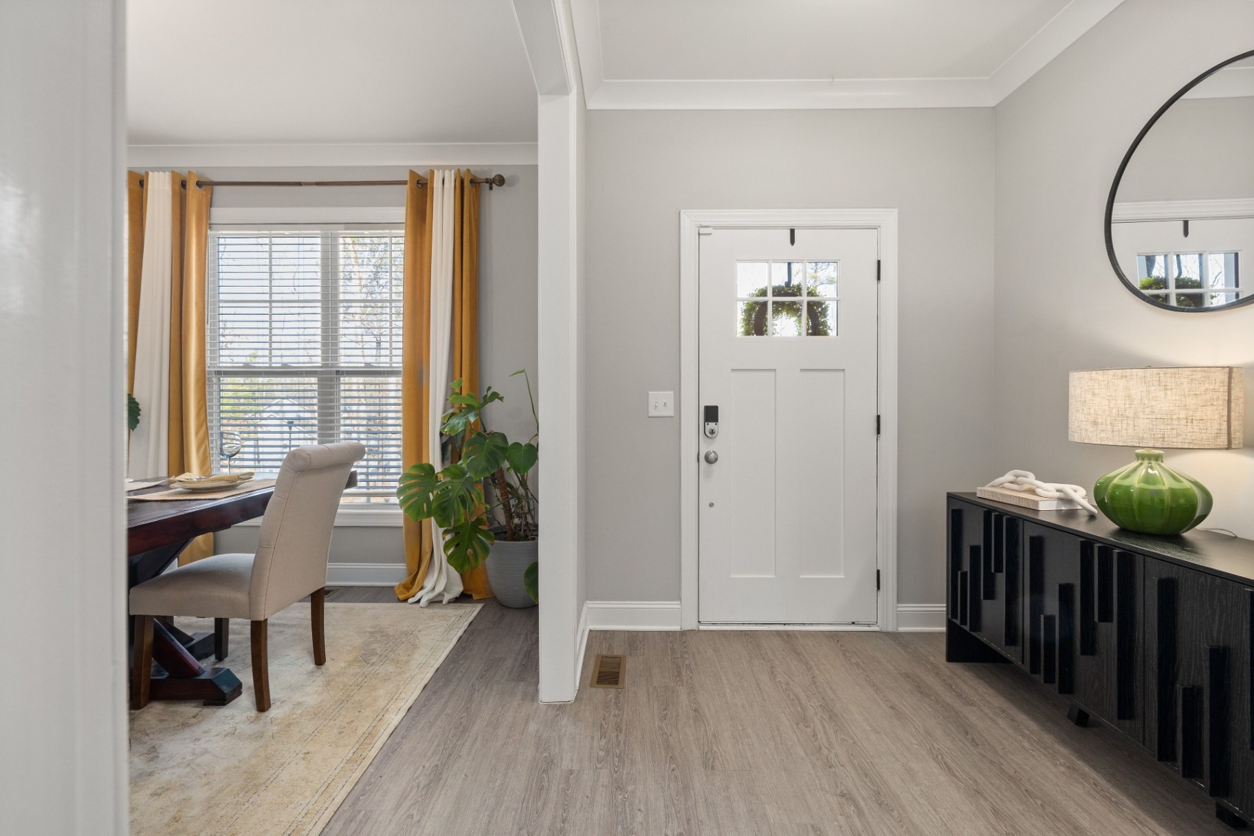 Interior 67134 — foyer with console table and dining view