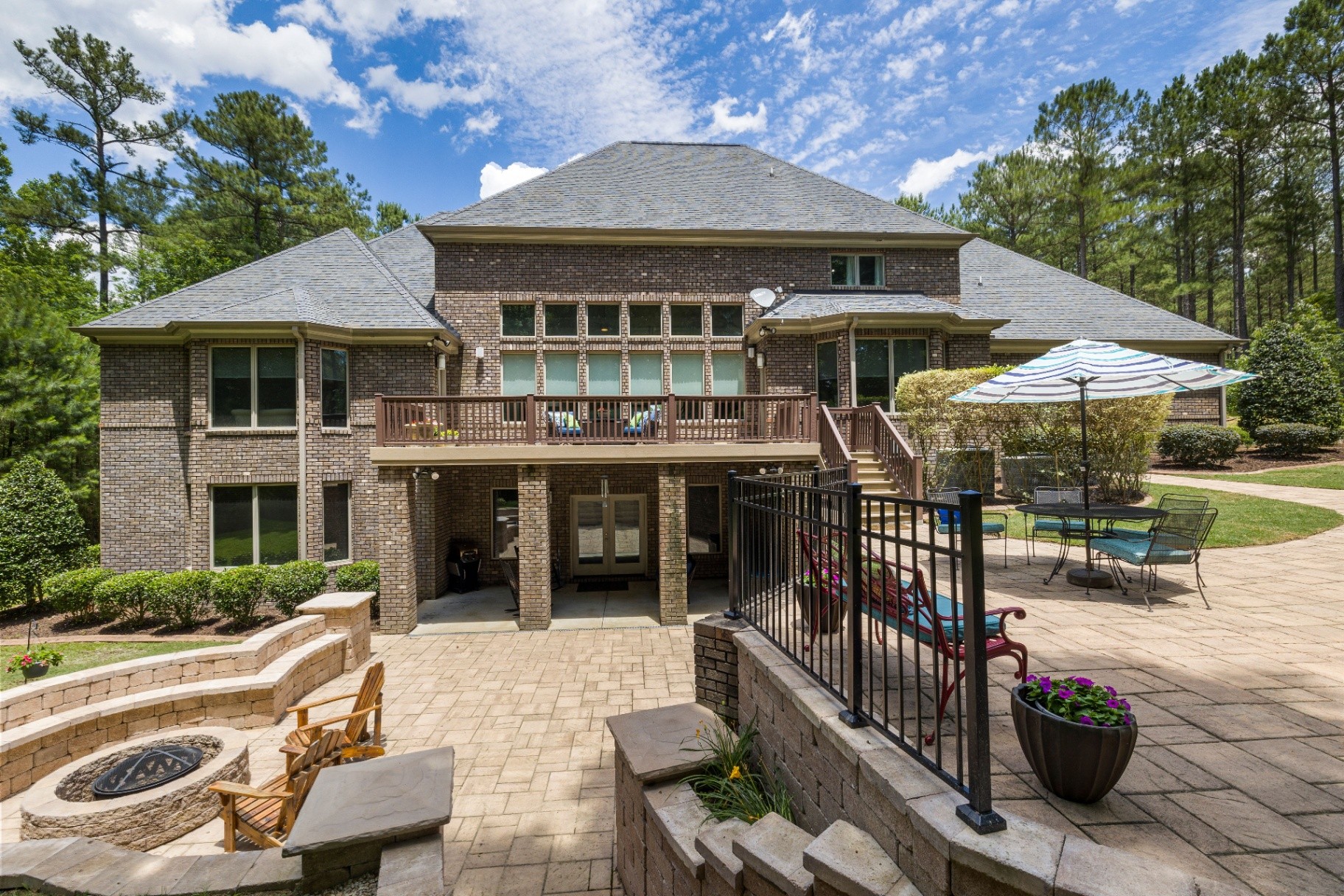 Interior 71604 — rear exterior patio and terrace with brick home