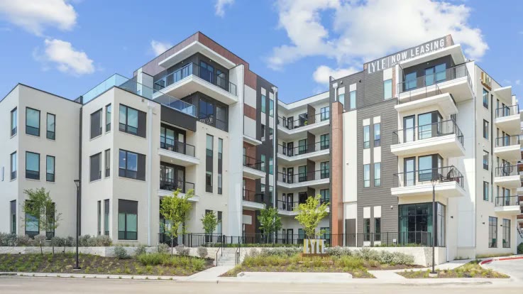Lyle apartments exterior with brick and modern facade