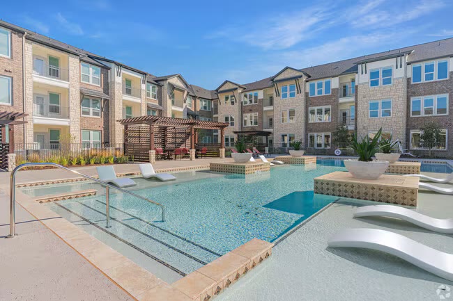 Royalton at Prosper apartment exterior with covered entry